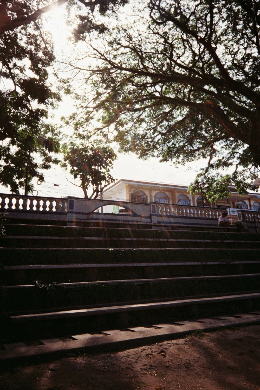 Dumaguete Vibes - A nostalgic glimpse of Dumaguete through 35mm film, with soft grain, warm tones, and quiet everyday moments that feel like memories you keep coming back to.
